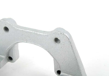 Soporte de pinza de freno trasero OEM 34216765885 para BMW E46, X3 E83 y E83N. Original BMW.