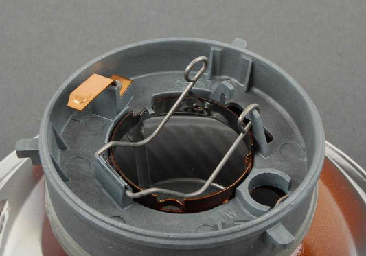 Óptica izquierda faro corto (luz de cruce) OEM 63121369851 para BMW E28 y E23. Recambio original BMW.