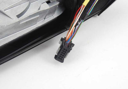 Espejo retrovisor derecho con cristal calefactable OEM 51167890040 para BMW E39 520d, 520i (modelos con transmisión manual y automática, tracción trasera). Acabado en negro brillante. Original BMW.