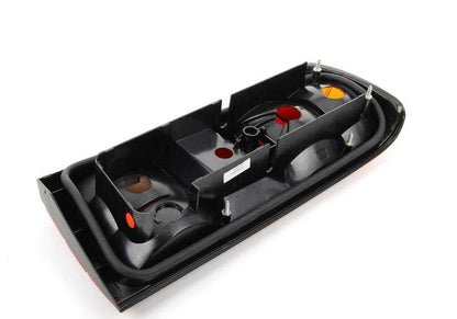 Izquierdo rear pilot OEM 63211385381 for BMW E30 318i, 318is, 320i {all compatible models}. Original BMW.