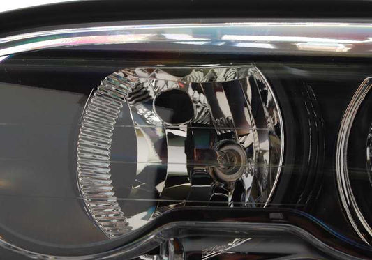 Faro delantero Bi-Xenón izquierdo OEM 63127165823 para BMW E46. Original BMW.