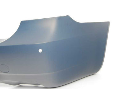 Parachoques trasero imprimado OEM 51128040567 para BMW Serie 3 E90 y E90N. Original BMW.