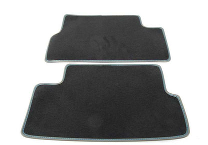 Juego de alfombrillas de moqueta con costura en azul caoba OEM 51477324847 para MINI R56 (Cooper, Cooper S, Cooper D, One) con cambio manual o automático. Original MINI.
