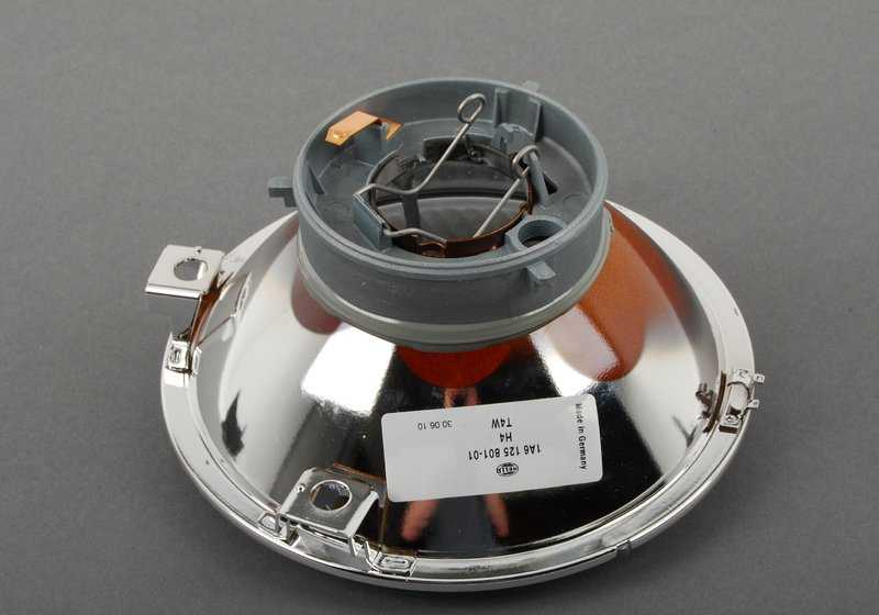 Óptica izquierda faro corto (luz de cruce) OEM 63121369851 para BMW E28 y E23. Recambio original BMW.