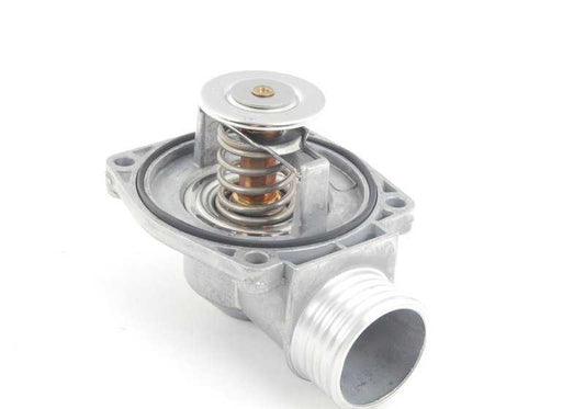 Connecting flange with thermostat OEM 11531704704 for BMW E38, E31, E32, E34 and E36. Original BMW.
