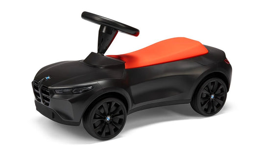 Coche correpasillos Baby Racer IV OEM 80932864211 para BMW. Para niños de 1 a 3 años. Diseño deportivo con asiento cómodo, volante ergonómico y claxon. Original BMW.