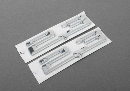 Front emblem OEM 51148412856 for BMW E36, Z3. Original BMW piece. Ideal to replace the uploaded or lost front logo in compatible models.