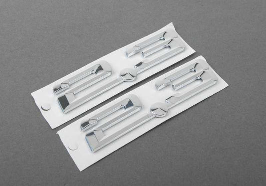 Front emblem OEM 51148412856 for BMW E36, Z3. Original BMW piece. Ideal to replace the uploaded or lost front logo in compatible models.