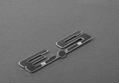 Front emblem OEM 51148412856 for BMW E36, Z3. Original BMW piece. Ideal to replace the uploaded or lost front logo in compatible models.