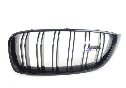Parrilla decorativa M Performance izquierda OEM 51712352811 para BMW F82 M4, F83 M4, F82 M4 LCI, F83 M4 LCI. Original BMW.