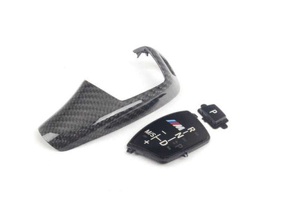 Embellecedor palanca cambio carbono M Performance OEM 61312250699 para BMW F07, F10, F11, F01, F02, F04 con cambio automático. Mejora estética interior con logo M. Original BMW.