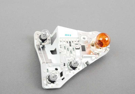Porta lámparas trasero derecho OEM 63217178384 para BMW Serie 3 E93 (todos los modelos compatibles: 320d, 320i N46T/N43, manual y automático). Original BMW.