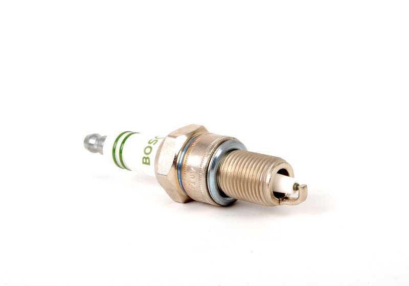 Bujía de encendido OEM 12121279599 para BMW E30, E28, E24, E23. Compatible con motores M20. Original BMW.