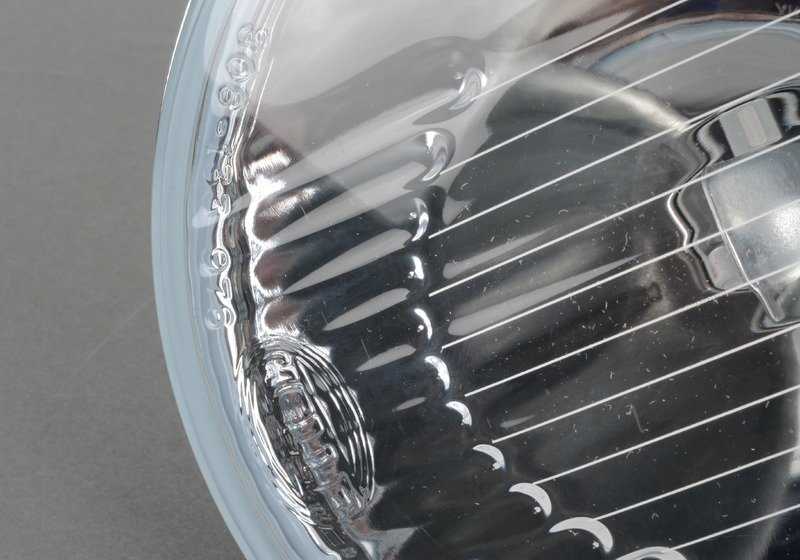 Luz de carretera derecha OEM 63121378338 para BMW E34, E32. Compatible con faros HELLA. Repuesto original BMW.