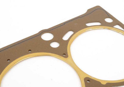 Junta de culata sin amianto OEM 11121721551 para BMW E30 318is y E36 318is. Compatible con motores M42, tanto manual como automático. Original BMW.