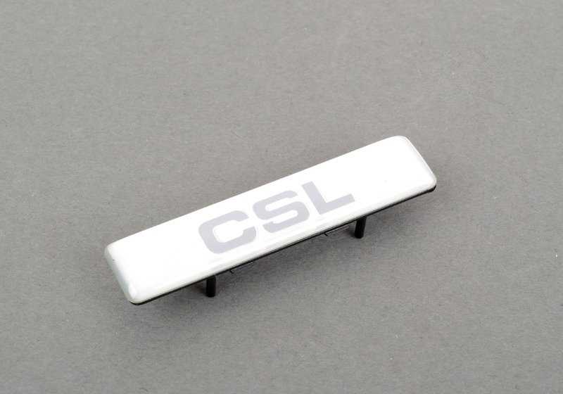 Emblema con base OEM 72127900607 para BMW E46 M3 CSL. Pieza original BMW. Ideal para sustituir el logo delantero o trasero con soporte incluido en tu BMW E46.