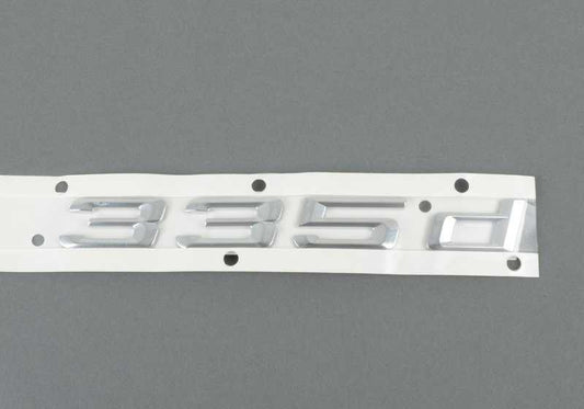 Rear emblem sticker for BMW E90, E90N (OEM 51147074726). Original BMW