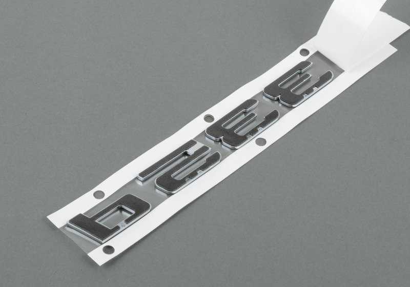Rear emblem sticker for BMW E90, E90N (OEM 51147074726). Original BMW