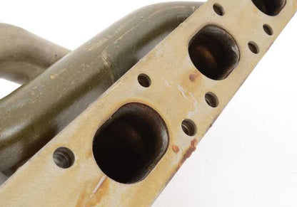 Colector de escape para BMW E30, E36 (OEM 11621728370). Original BMW.