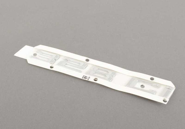 Emblema trasero adhesivo OEM 51148240124 para BMW E46. Original BMW.