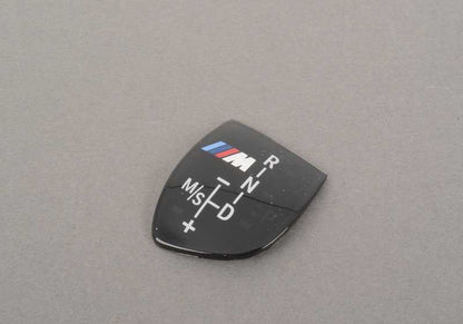 Embellecedor palanca cambios M Performance carbono OEM 61312250703 para BMW F10, F11, F06, F12, F13. Compatible con modelos con cambio automático deportivo. Original BMW.
