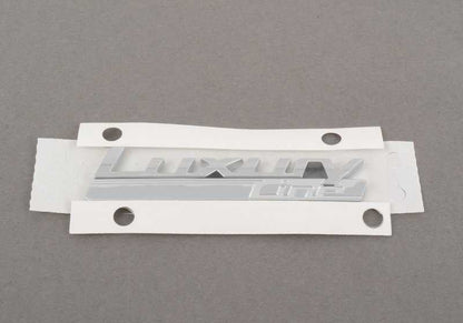 Inscripción lateral para BMW Serie 2 F22, F23, F45, F46, F87, Serie 3 F30, F31, F34, Serie 4 F32, F33, F36 (OEM 51147418530). Original BMW