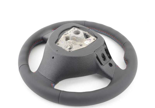 Volante sportivo in pelle con camme di scambio OEM 32337845947 per BMW F10 M5. BMW originale.