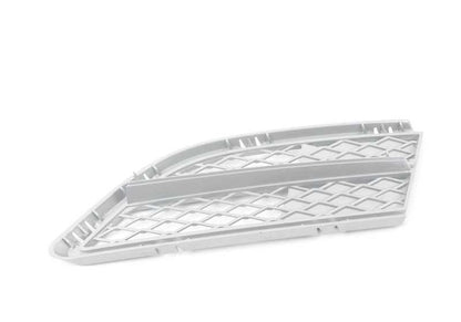 Rejilla izquierda parachoques OEM 51117228953 para BMW E90, E91. Original BMW.