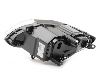 Faro delantero Bi-Xenón derecho con acabado cromado OEM 63127165708 para BMW E85 Z4. Original BMW.