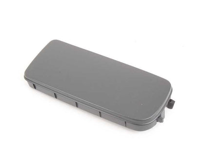 Tapa lateral izquierda OEM 51118122449 para BMW E36. Pieza original BMW. Color gris oscuro. Compatible con varias versiones del parachoques delantero.