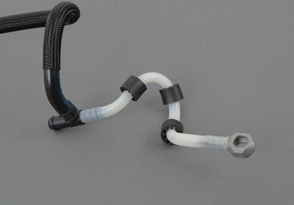 Tubería de retorno de combustible OEM 13537806962 para BMW E70, E70N, E71. Original BMW.