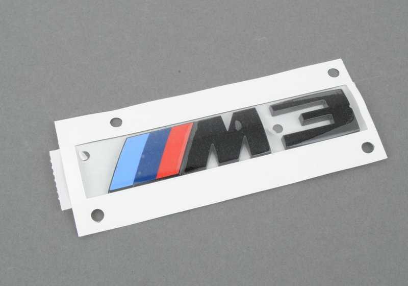 Emblema Omrololor 51148068580 per BMW F80 M3. Compatibile con i modelli: F80 M3 (3C91, 3C92, 8M91, 8M92). Emblema adesivo con strisce colorate M. BMW originale.