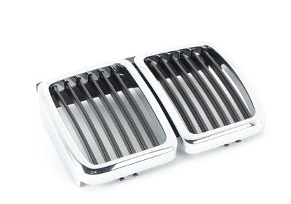 Rejilla decorativa central OEM 51132233001 para BMW E30 M3 (modelos: M31001, M31005, M31007). Compatible con versiones de 1986 a 1990. Original BMW.