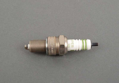 Bujía Bosch W7DC OEM 12129062594 para BMW E12, E21, 114. Compatible con motores M10. Original BMW.