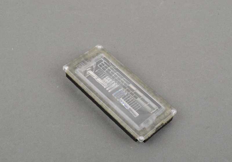 Lente de luz para maneta del portón trasero OEM 51137165524 para BMW E65, E66. Original BMW.