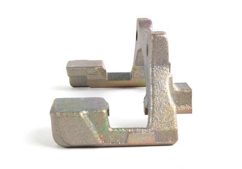 Soporte de pinza de freno trasero OEM 34211163648 para BMW E39. Original BMW.