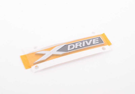 Emblema "X-DRIVE" OEM 51147318575 para BMW F01N, F02N. Insignia original para maletero o carrocería. Compatible con modelos Serie 7. Pieza original BMW.