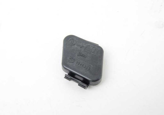 Tapa protectora faro delantero izquierdo OEM 63117046373 para BMW E82, E88 (118d, 120d, 120i). Compatible con modelos manuales y automáticos. Original BMW.