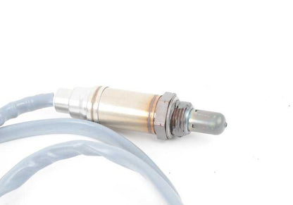 Sonda lambda OEM 11787513963 para BMW E60, E61, E65, E66, E83, E85. Control de emisiones para motor. Longitud 990mm. Original BMW.