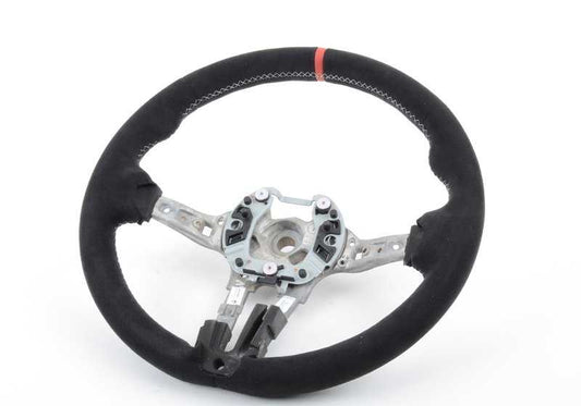 Volante deportivo M Performance OEM 32302344149 para BMW F15 y F16. Tapizado en Alcantara con detalles en carbono y marca roja central. Mejora el agarre y añade estilo racing. Original BMW.