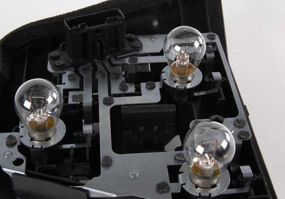 Portalámpara trasera izquierda OEM 63217165955 para BMW Serie 3 E46 (1997-2005). Original BMW.