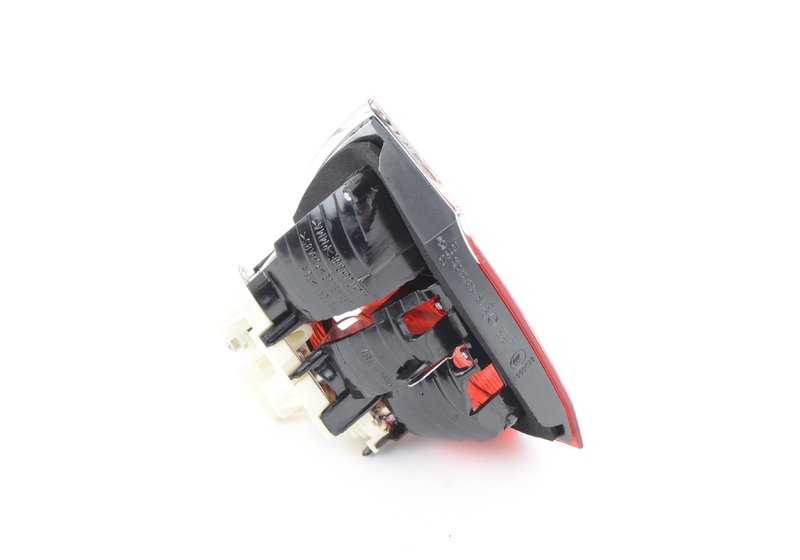 Piloto trasero izquierdo portón OEM 63210406883 para BMW E90. Original BMW.