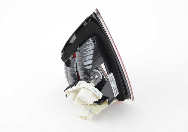 Piloto trasero derecho del portón OEM 63210406884 para BMW E90. Original BMW.