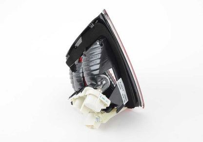 Piloto trasero derecho del portón OEM 63210406884 para BMW E90. Original BMW.