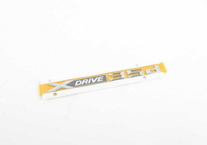 Emblema "X3" OEM 51147362493 para BMW E83, F25, F26, E70. Original BMW.