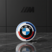 Emblema BMW logo 50 anniversario 82mm (capó o trunk) versione adesiva. BMW originale