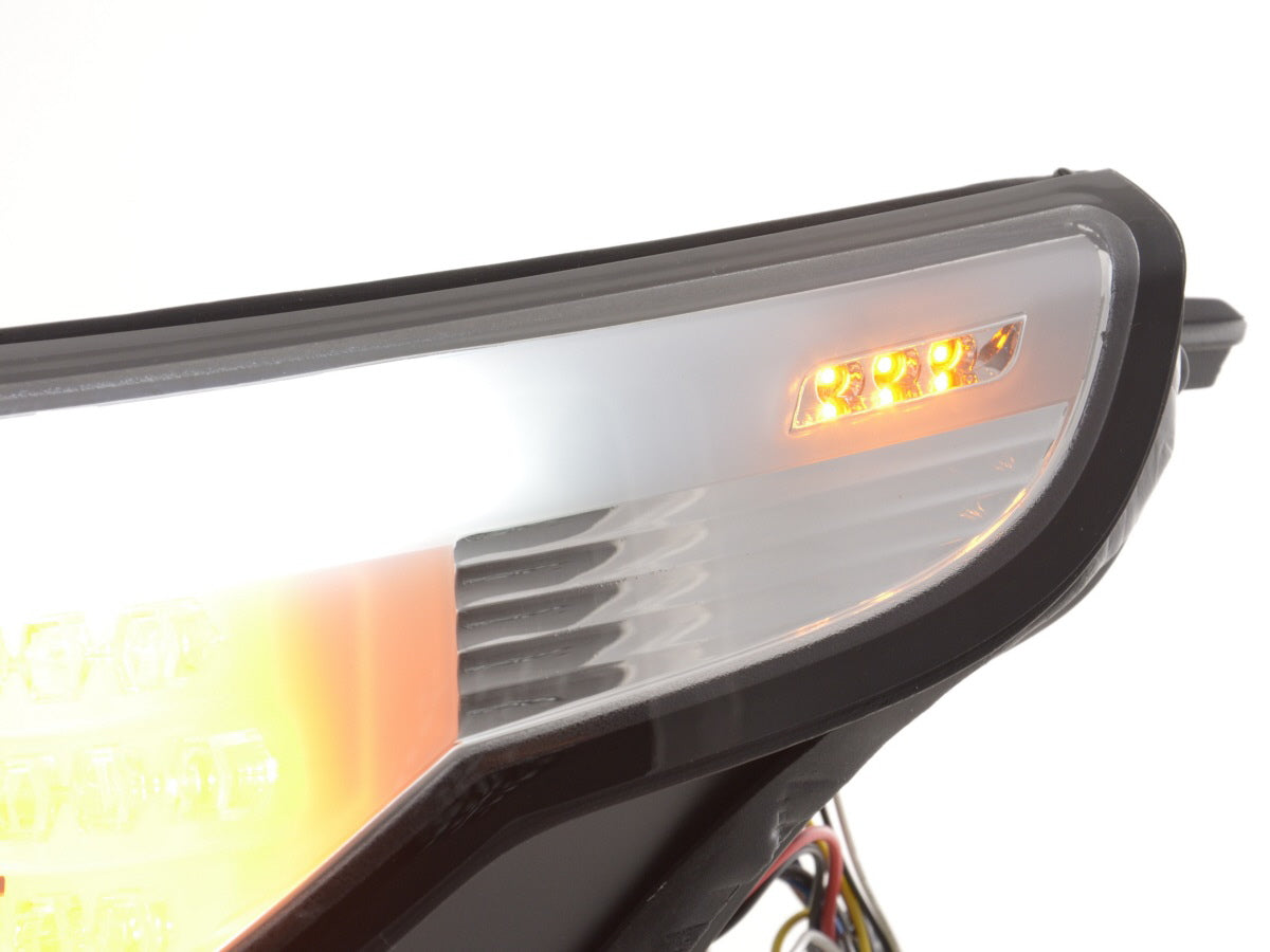 Faros delanteros xenón ojos de angel LED BMW Serie 5 E60 / E61 03-04 cromados para volante a la derecha