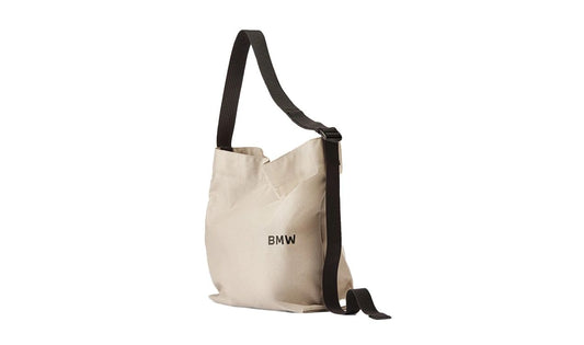 Bolso bandolera beige OEM 80225B5F635 para BMW. Ideal para uso diario, con correa ajustable, compartimento para botella y diseño resistente al clima. Volumen 15L. Original BMW.