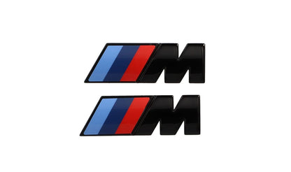 M side logos (set of 2) gloss black for BMW G42, G20, G21, G28, G22, G23, G26, G05, G18, G06, G07. Original BMW.