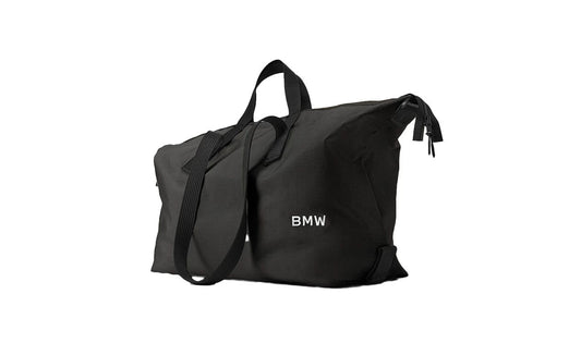 Bolsa de viaje BMW negra 35 L OEM 80225B5F637. Ideal como equipaje de mano, resistente al agua y con diseño original BMW para todos los modelos BMW. Producto original BMW.